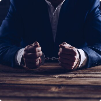 criminal in handcuffs